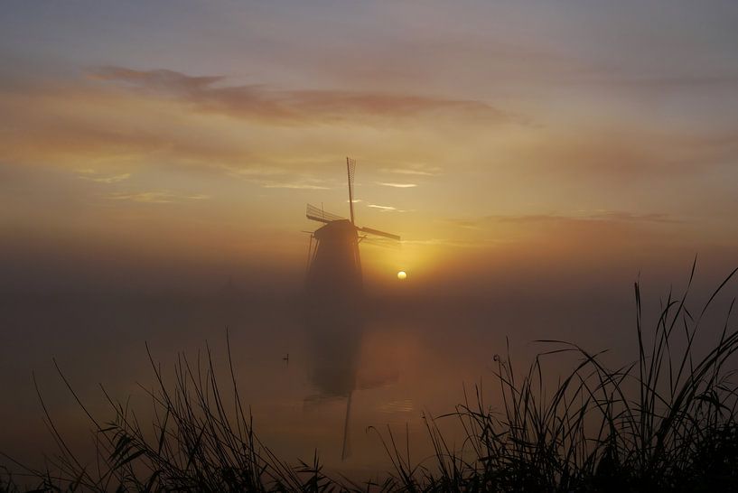 Mistige zonsopkomst van G. de Wit