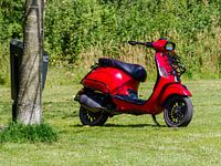 Abandoned scooter on estate.