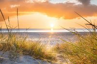 Sunrise on the beach by the Baltic Sea