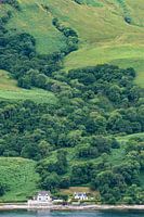 Huis onder aan helling