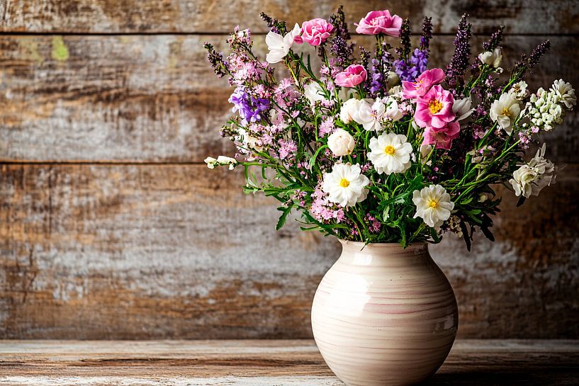 Colourful flowers in ceramic vase by Imperial Art House