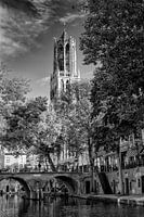 Utrecht's Dom tower seen from the wharf on the Oudegracht canal (black and white)