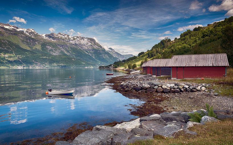 red houses and a boat in the fjord in norway by ChrisWillemsen