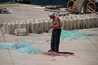 Visser aan het netten boeten 