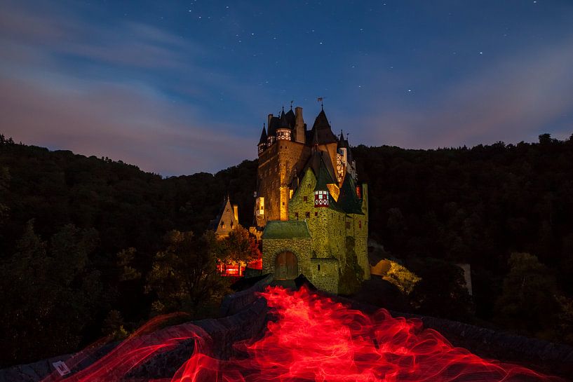 ghostly Eltz Castle whit light painting  by Marcel Derweduwen