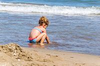 kindergeluk aan het water