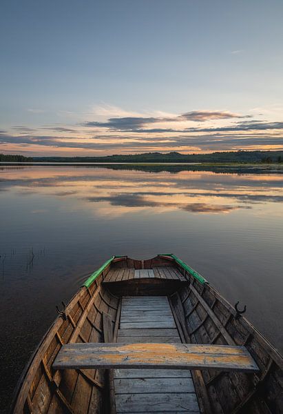 Wooden sloop in lake in northern Sweden by Elles van der Veen
