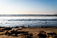 Calm waves with a clear blue sky