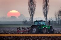 tractor voor de zon