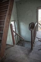 Old hat at deserted stairs