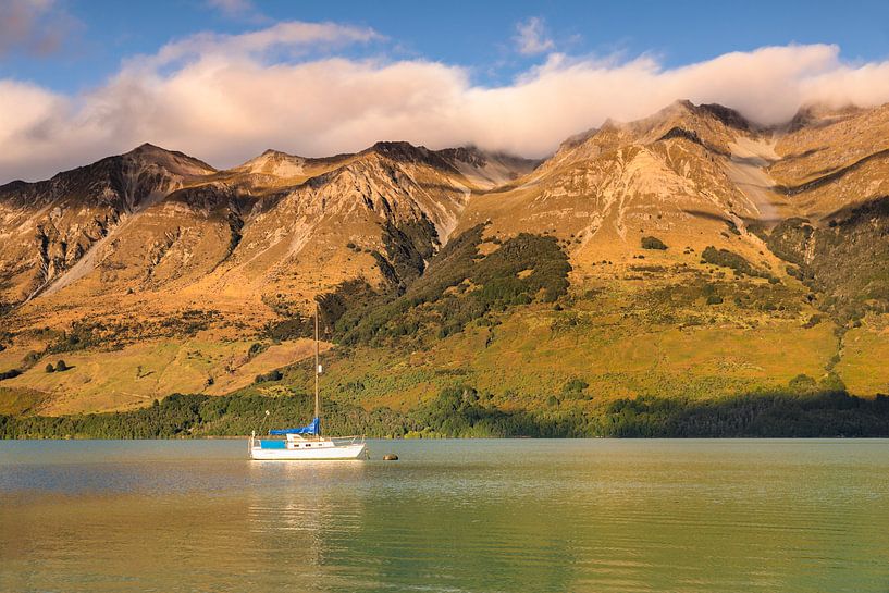 Sailing boat in the Glenorchy Lagoon, New Zealand by Markus Lange