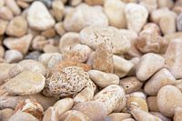 White pebbles, selective focus