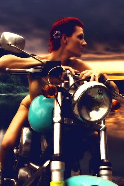 Naked red-haired young woman on motorbike at sunset (woman on motorbike). by Cor Heijnen