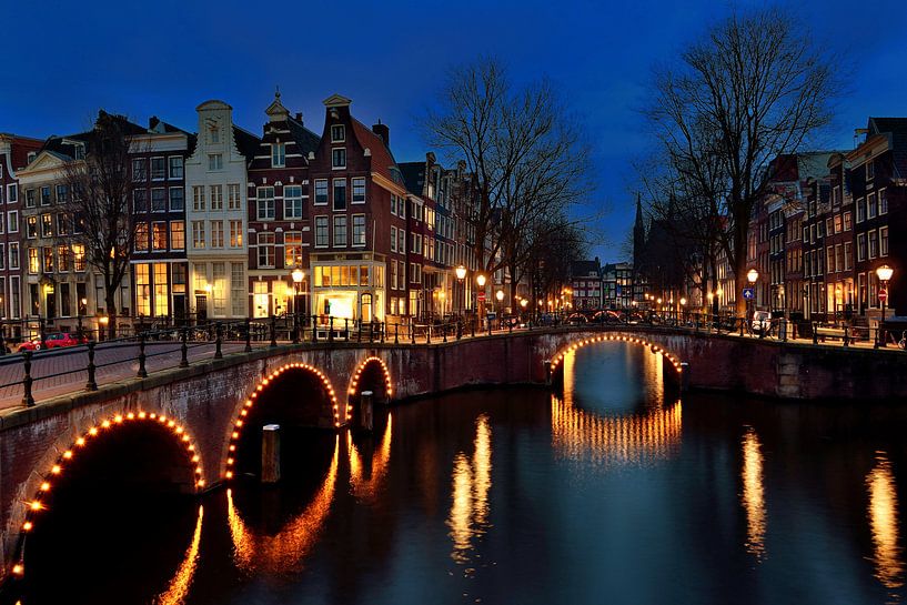Amsterdam canals by night by John Leeninga