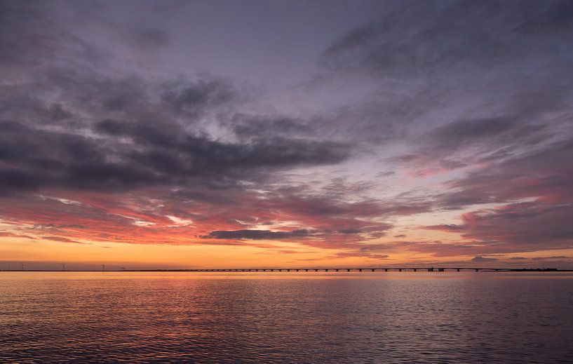 Zeeland bridge at sunset by Jan Jongejan