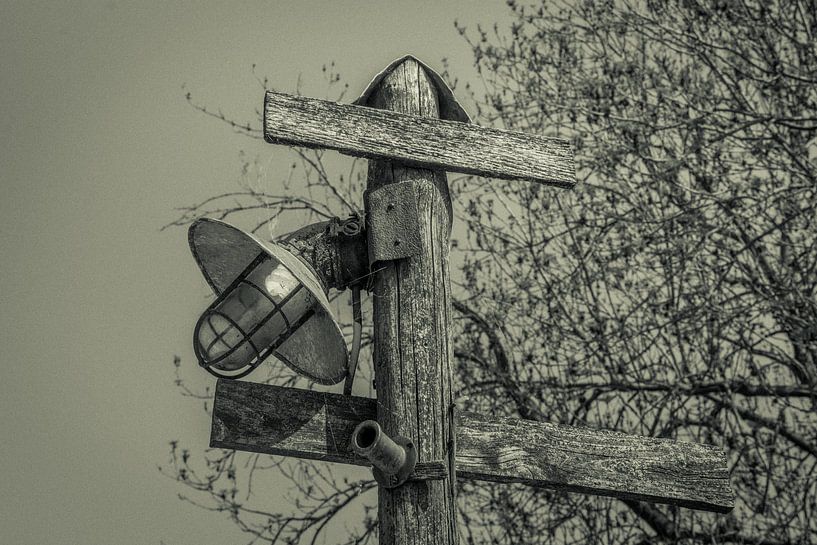 Old lamp post by Adri Vollenhouw