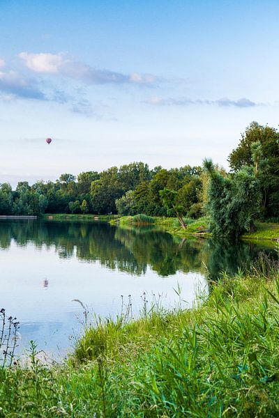 Limburgian landscape of a fishpond and an air balloon in the air (soothing) by Debbie Kanders