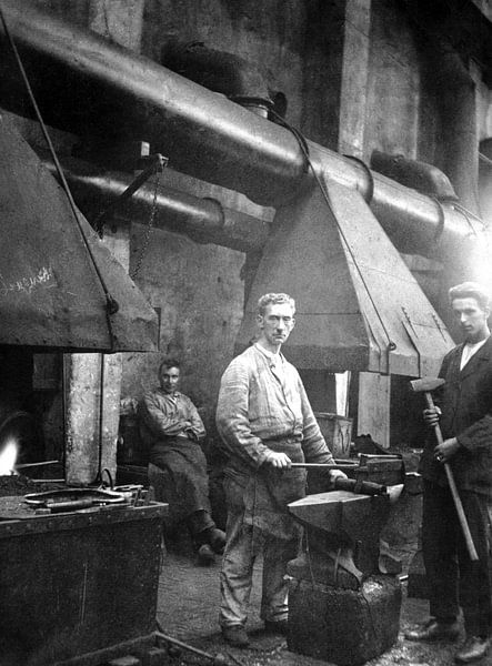 Le forgeron au travail par Edwin Butter