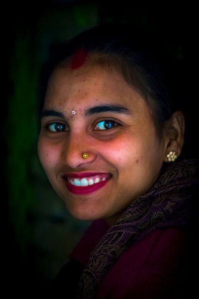 Smiling Nepali saleswoman by Andre Brasse Photography