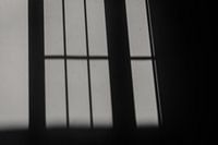 Zakynthos, Greece - Shadow play of window with sunlight on white wall