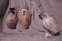 Pitchers in the sand