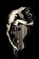 photo poster ou décoration murale homme guitare