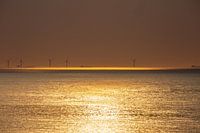 Windmolens bij zonsondergang