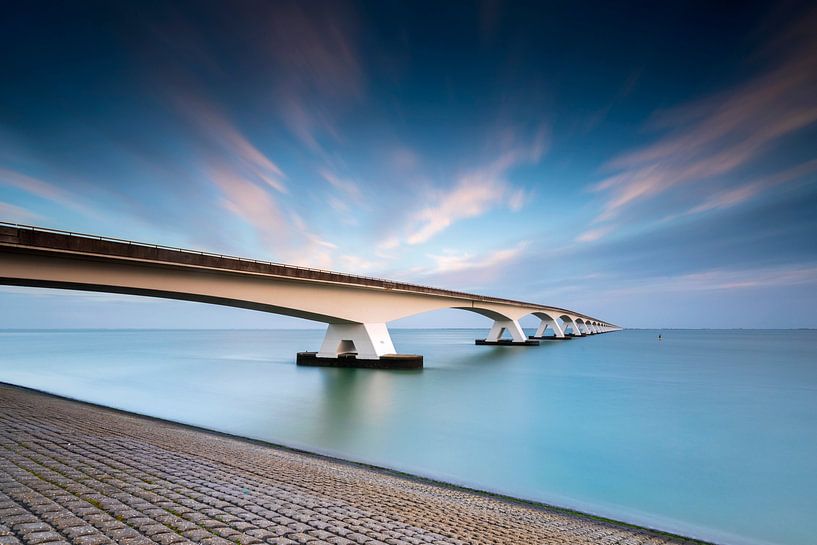 Sunrise behind the Zeeland bridge in the province of Zeeland by gaps photography