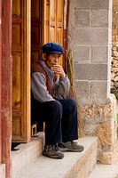 Chinese man in doorway