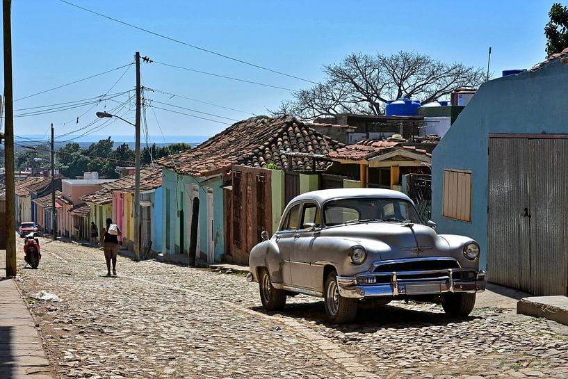 Silver old-timer in an old, colorful street in Trinidad, Cuba by Jutta Klassen