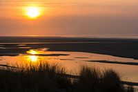 Zonsondergang aan de waddenzee