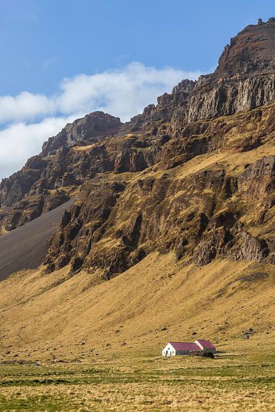Farmhouse at the foot of an Icelandic giant by Mark Sluijmers