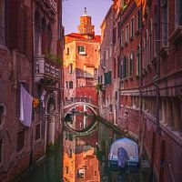 Venice cityscape, boat in the canal and bridge. Italy