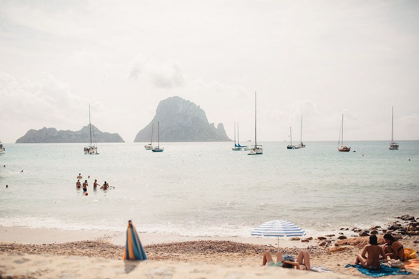 On a beach in Ibiza with a view on boats and mountains | Nature | Landscape Photography by eighty8things