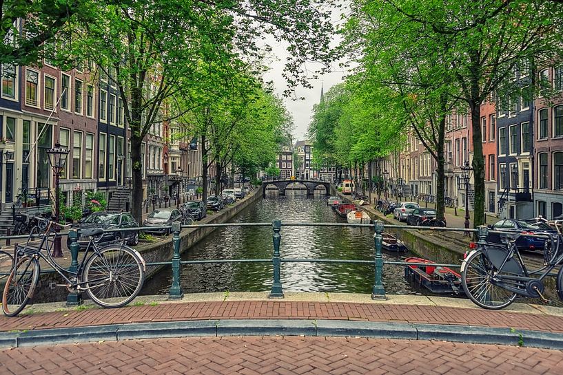 Canal in Amsterdam by Manjik Pictures