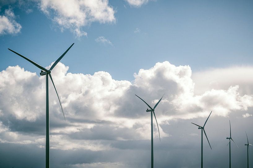 Wind turbines with blue sky and white clouds in the background by Sjoerd van der Wal Photography