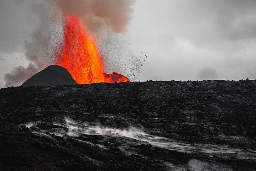 The volcano behind the lava field by Martijn Smeets