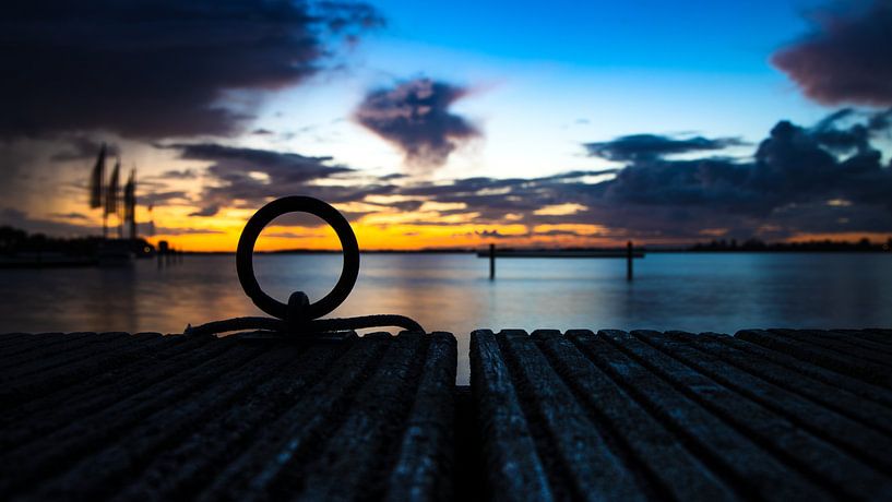 Un lever de soleil depuis la jetée en Hollande du Nord par Hans de Waay