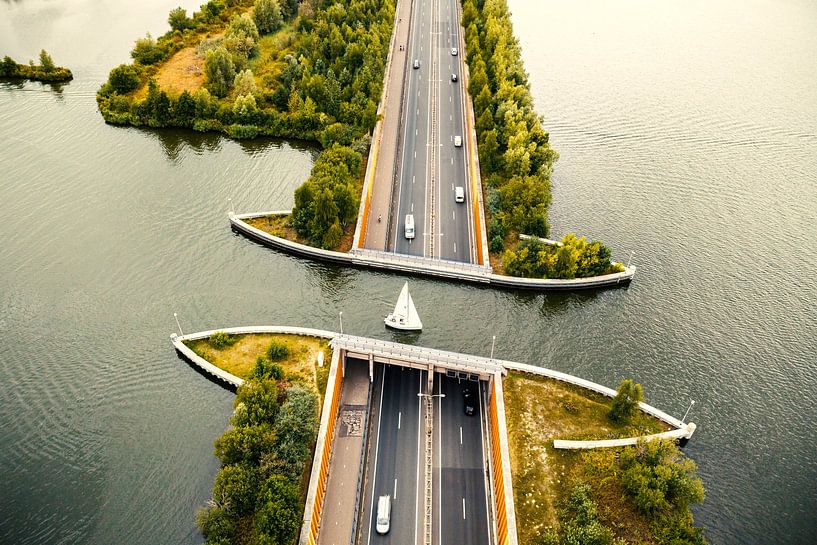 Aqueduct Veluwemeer in the Veluwe lake with a boat sailing in th by Sjoerd van der Wal Photography
