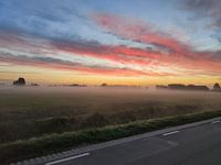 Lever de soleil dans le brouillard