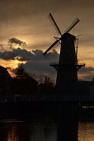 Moulin à Schiedam au coucher du soleil