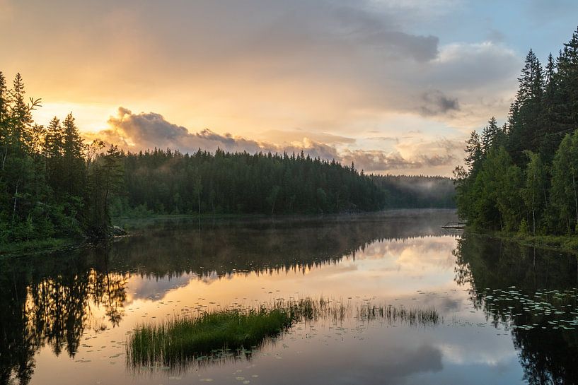 Swedish lake at sunset by Axel Weidner
