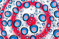 Drops with psychedelic circles in red, white and blue