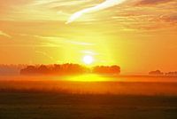 opkomende zon boven Ter Idzard