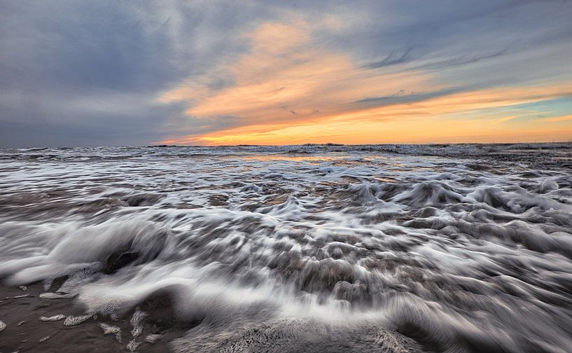 Raging waves at Sunset by peterheinspictures