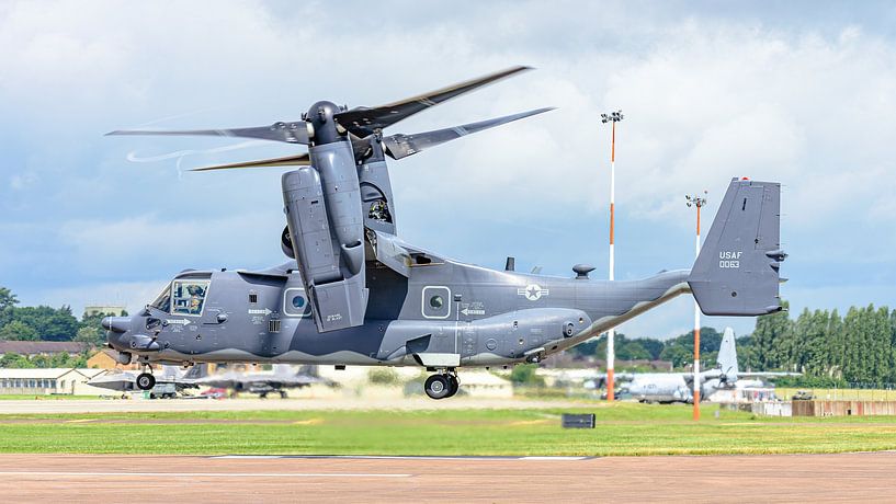 A Bell Boeing CV-22B Osprey of the U.S. Air Force leaves for its home base in England after the Roya by Jaap van den Berg