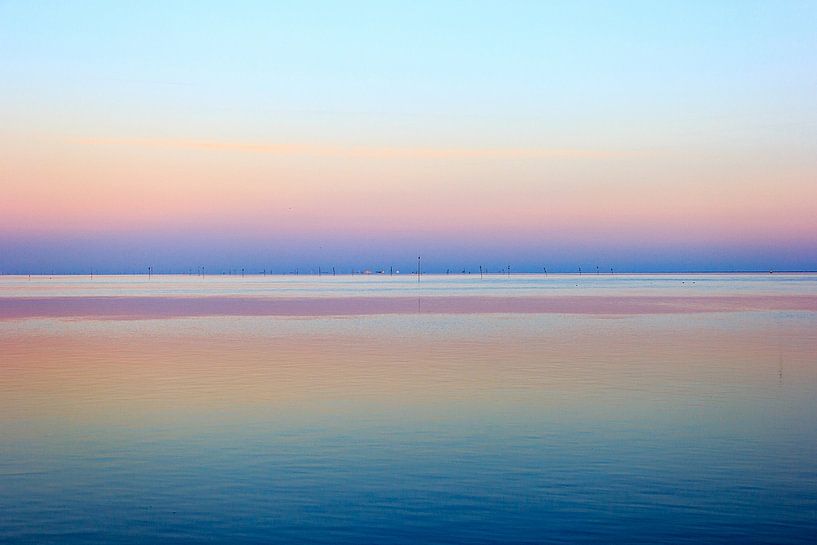 Sunset on the mud flats by Olaf Douma