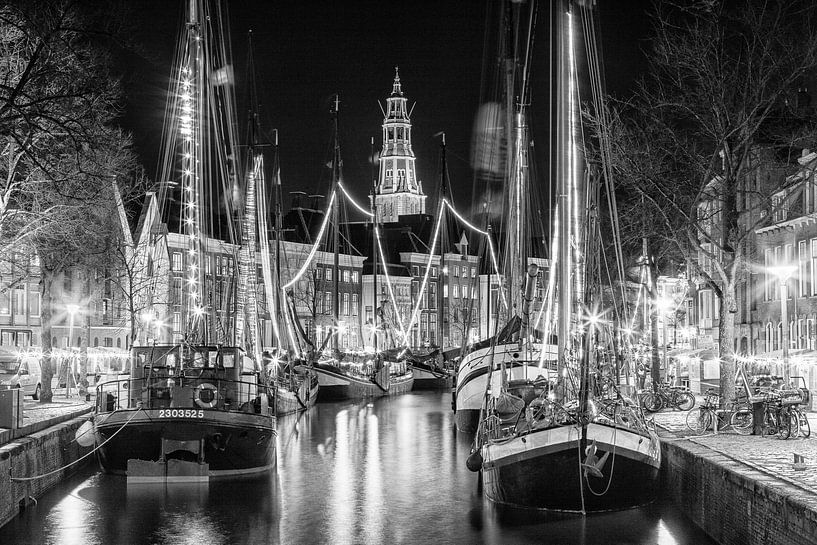 Sailingboats at night in the city of Groningen, Netherlands by Evert Jan Luchies