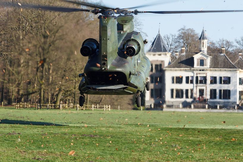 Chinook helicopter lands near a castle by Arjan van de Logt