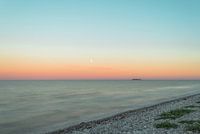 Pebble Beach With Setting Sun
